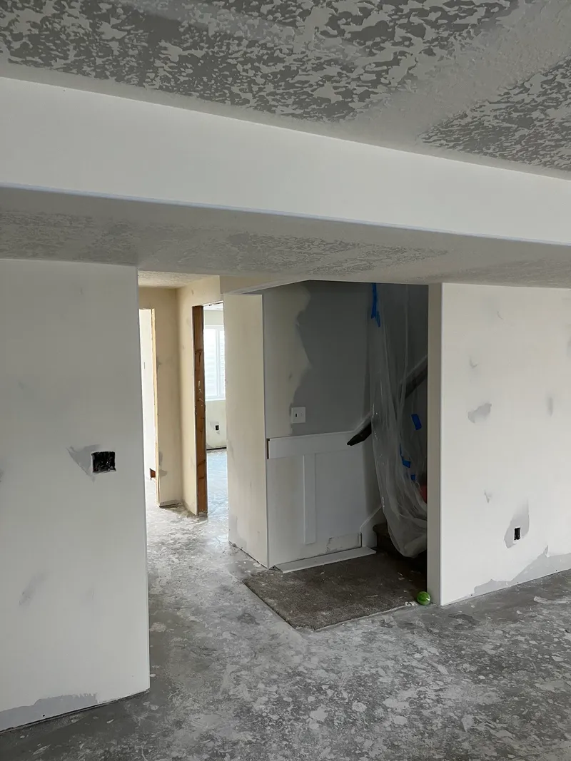 Finished basement living space by Drywall Techs