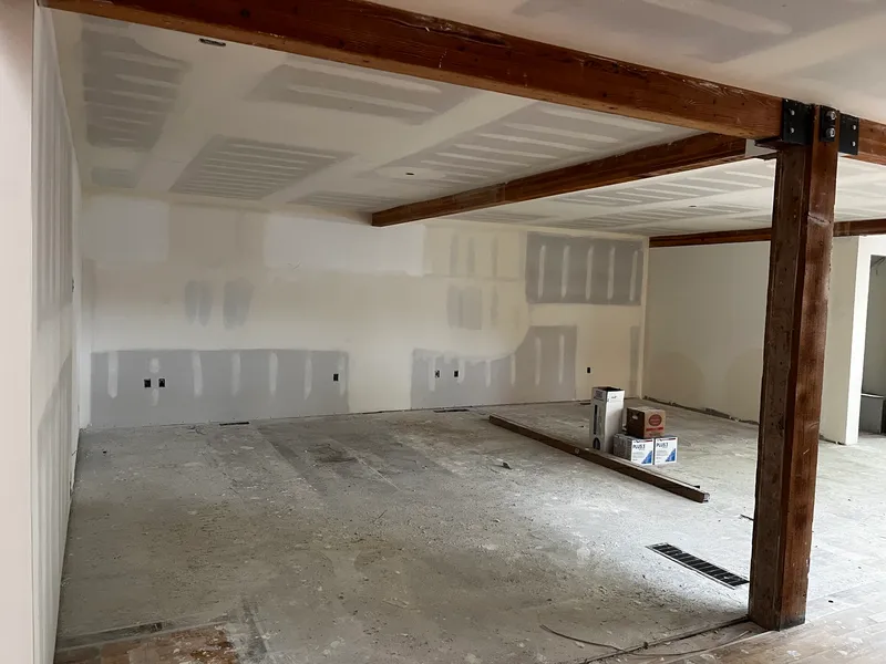 Drywall taping and finishing work in progress